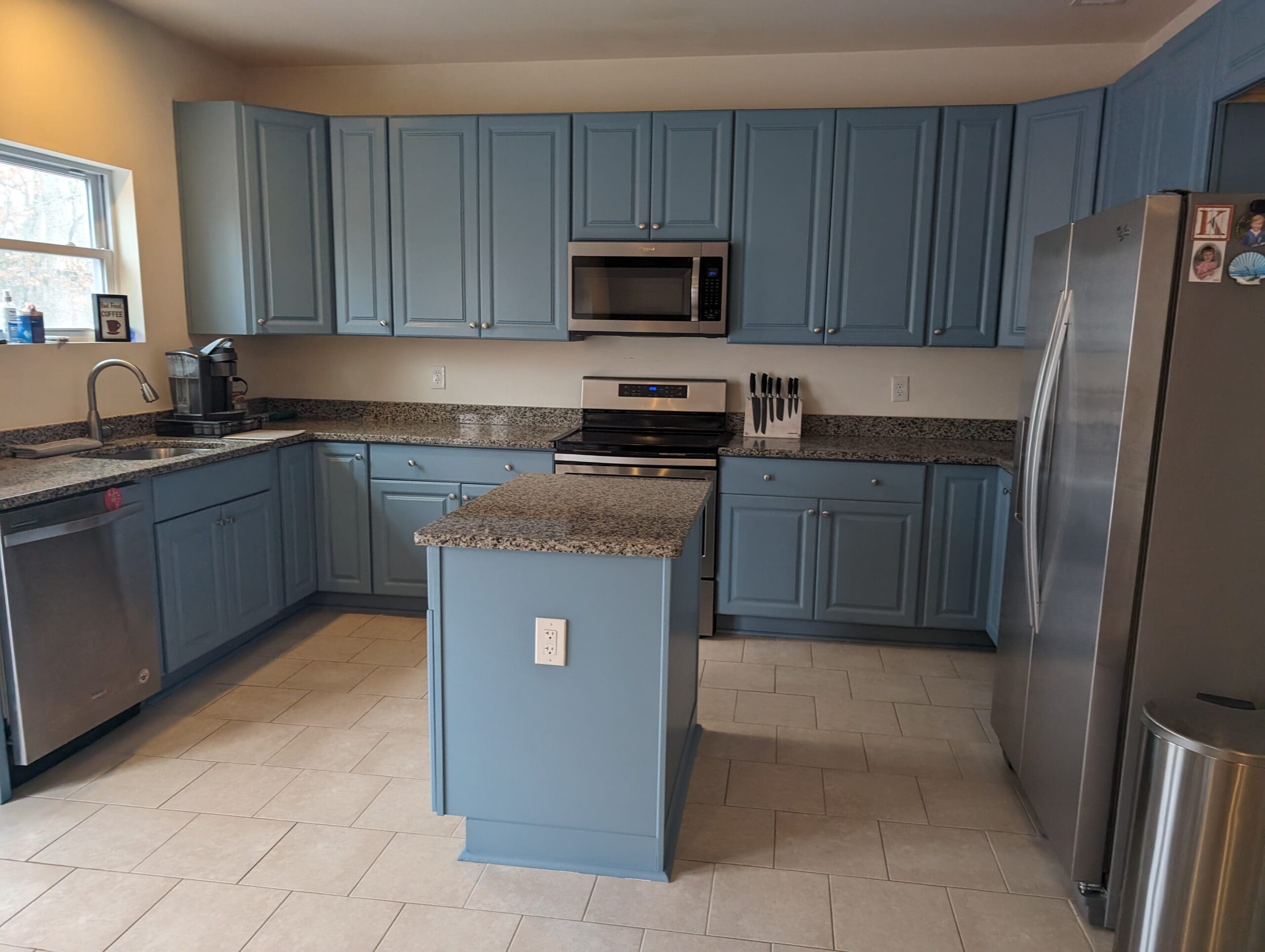 When to Refinish Cabinets vs. Repaint Them